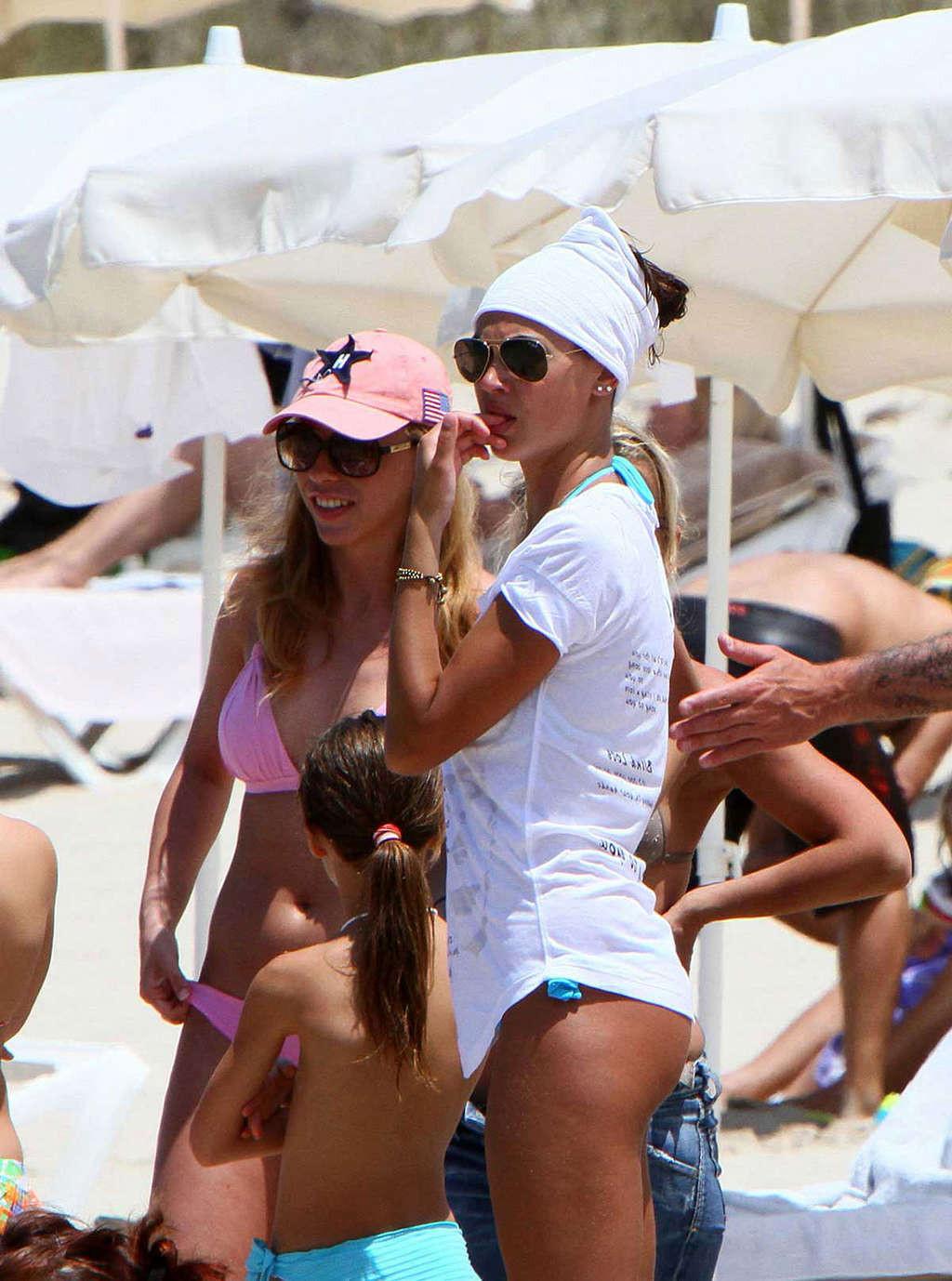 16P Melissa Satta exposing her sexy body and hot ass in thong on beach