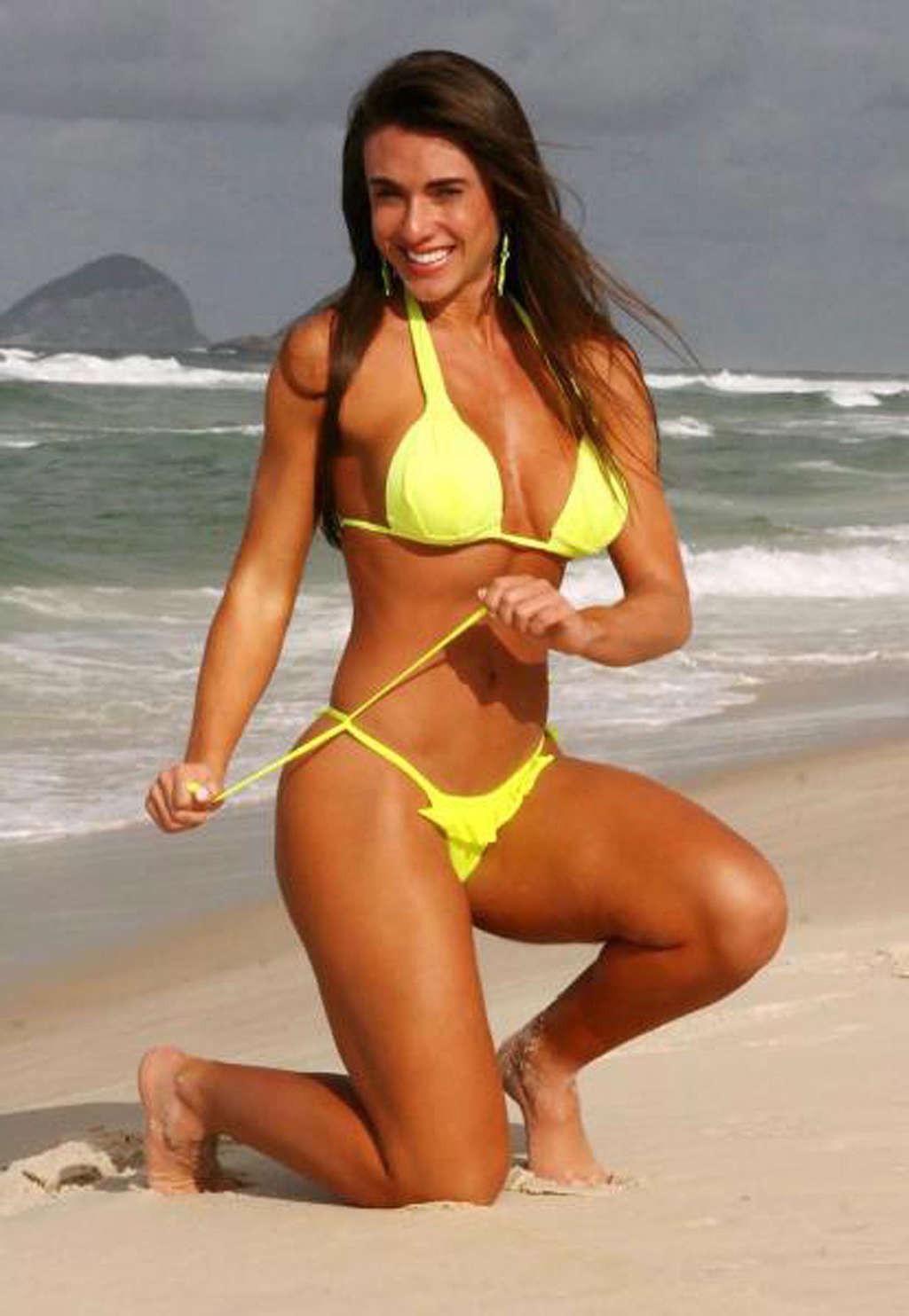 16P Nicole Bahls exposing her huge boobs and sexy ass in thong