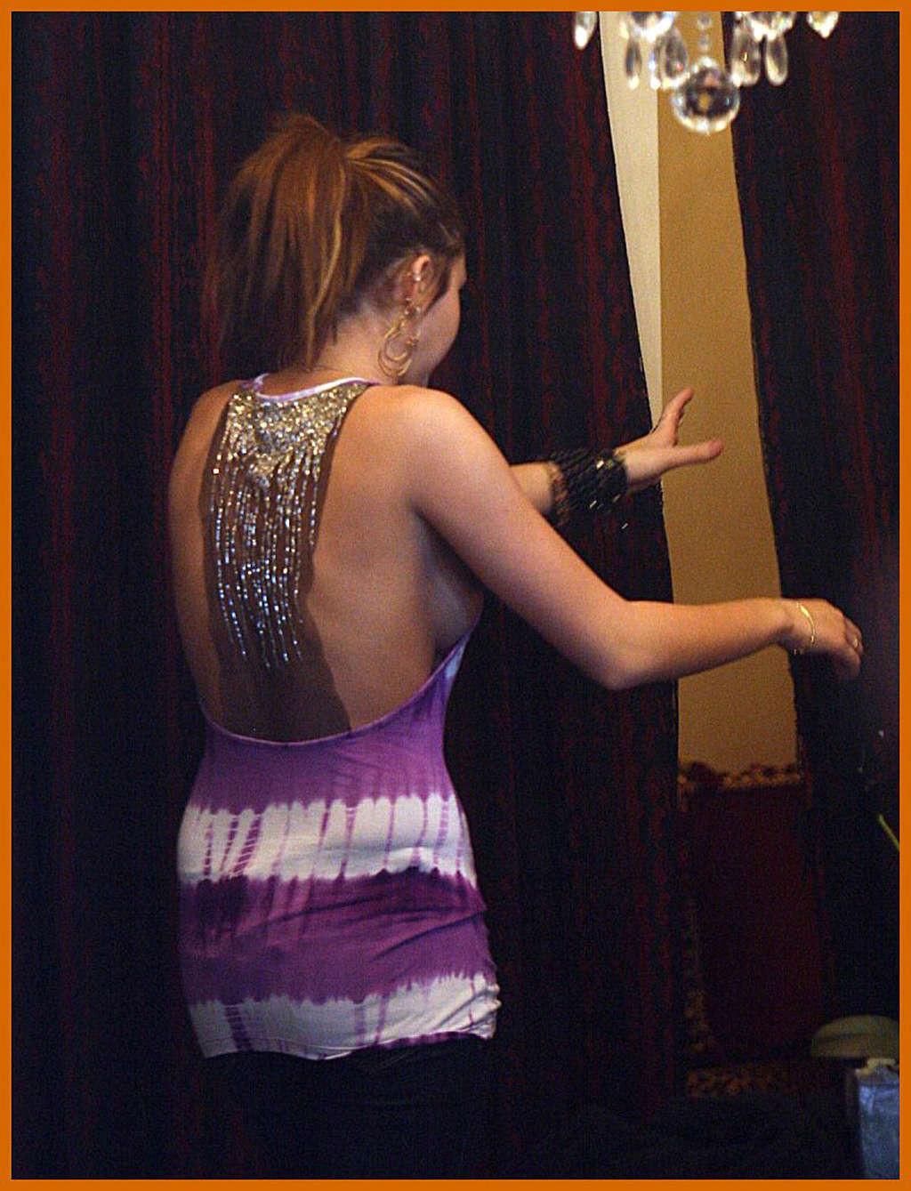 16P Miley Cyrus side boob and legs show in video making
