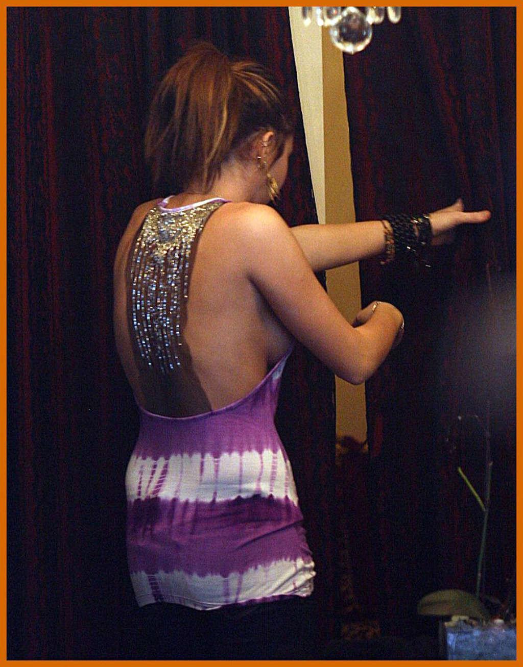 16P Miley Cyrus side boob and legs show in video making
