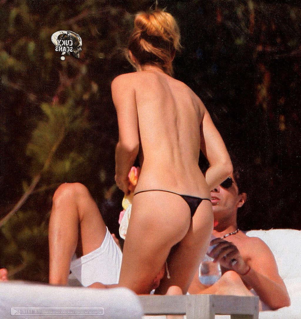 16P Daniela Urzi exposing her nice big tits on beach and in thong