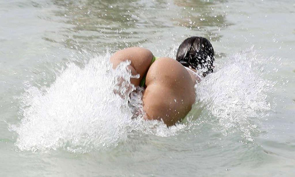 16P Nana Gouveia showing her great ass in thong on beach