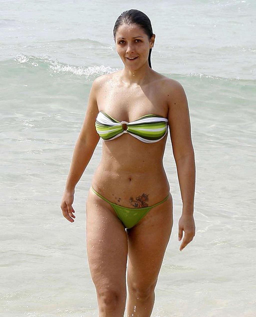 16P Nana Gouveia showing her great ass in thong on beach