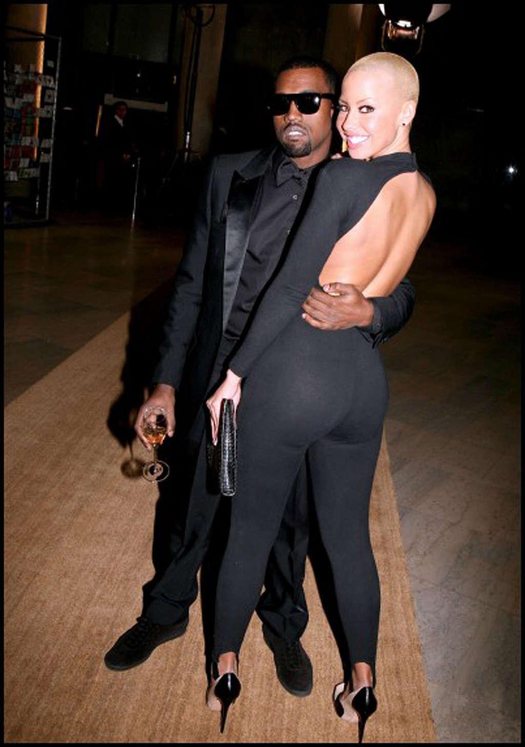 16P Amber Rose showing her big tits and fucking sexy ass in thong