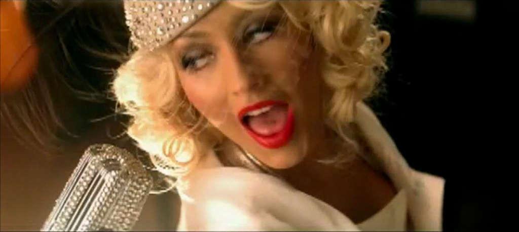 10P Christina Aguilera looking very hot in lingerie in her video spot and show tits 