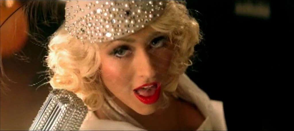 10P Christina Aguilera looking very hot in lingerie in her video spot and show tits 