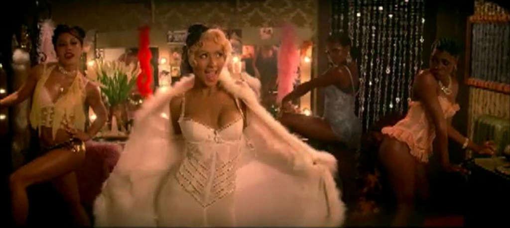 10P Christina Aguilera looking very hot in lingerie in her video spot and show tits 