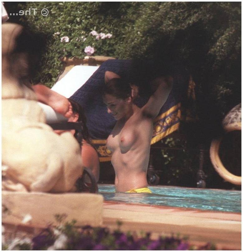 15P sexy British milf Liz Hurley caught going comando