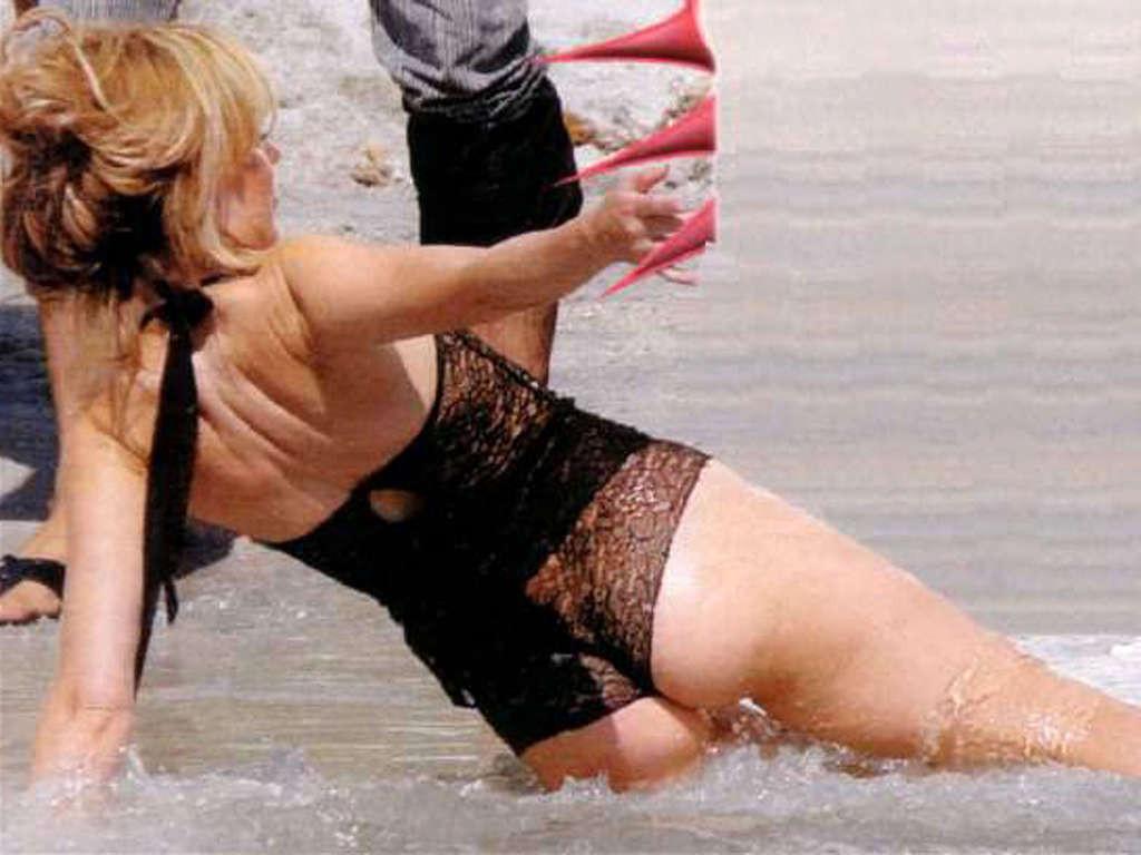 16P Kylie Minogue showing hot body and extremely sexy ass in thong