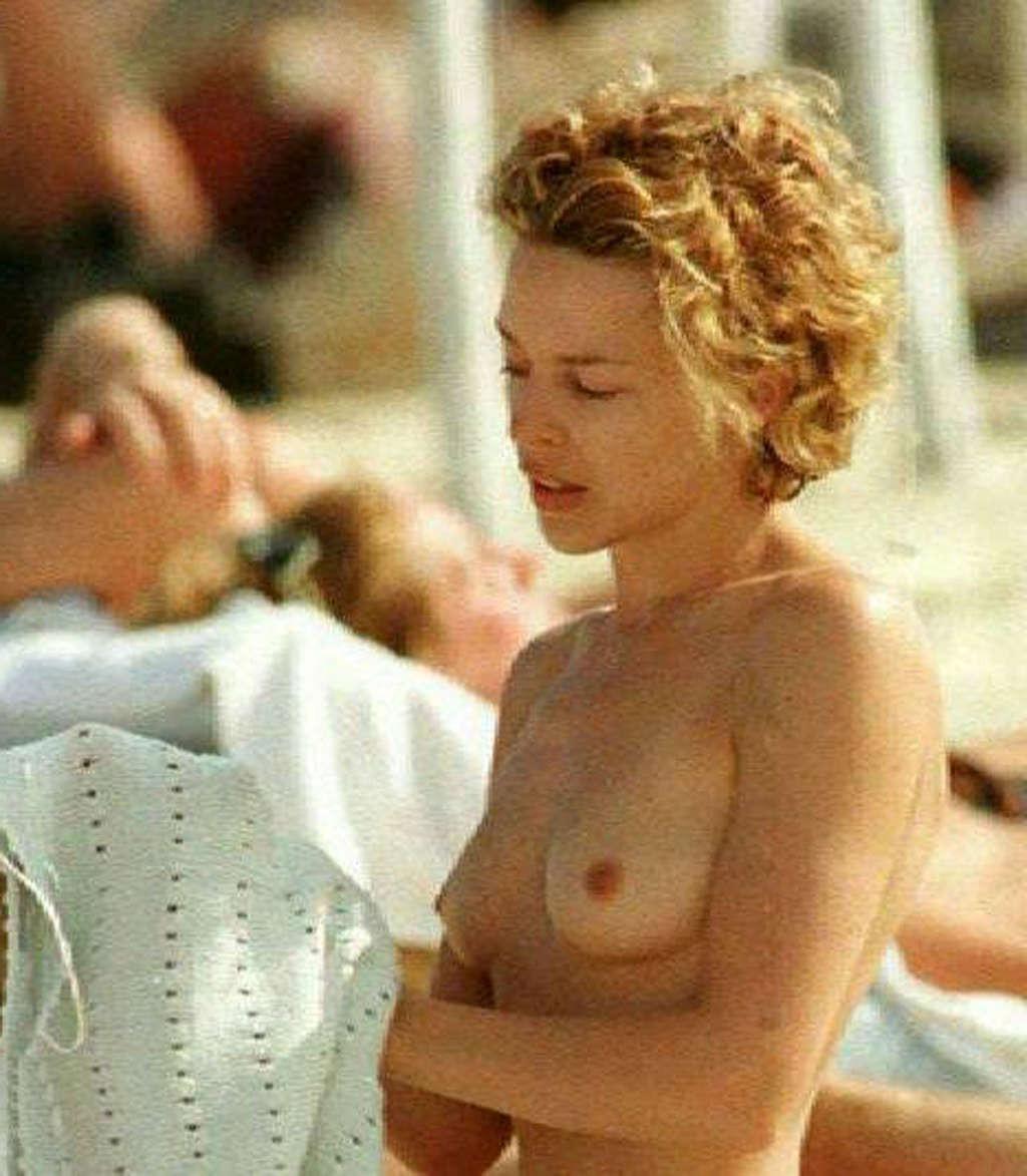 16P Kylie Minogue showing hot body and extremely sexy ass in thong