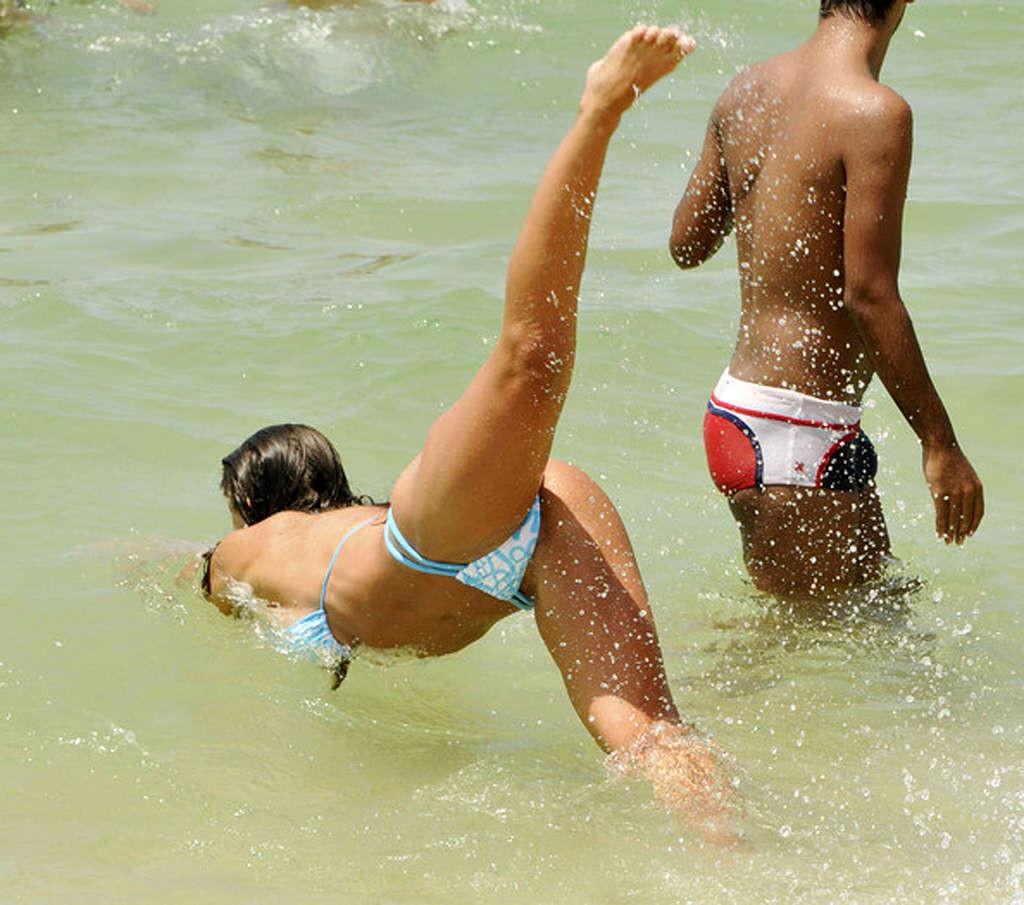 10P Nicole Bahls exposing her nice ass in thong and posing in bikini