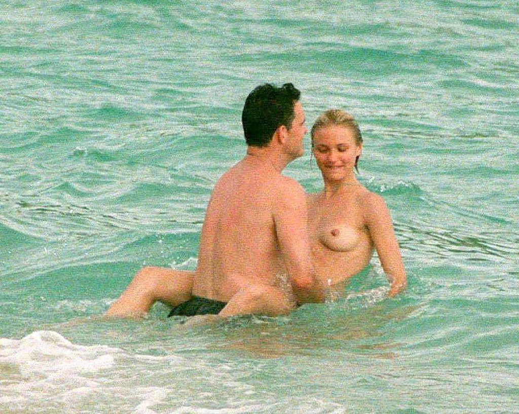 16P Cameron Diaz showing sexy ass in thong and enjoying on beach in topless