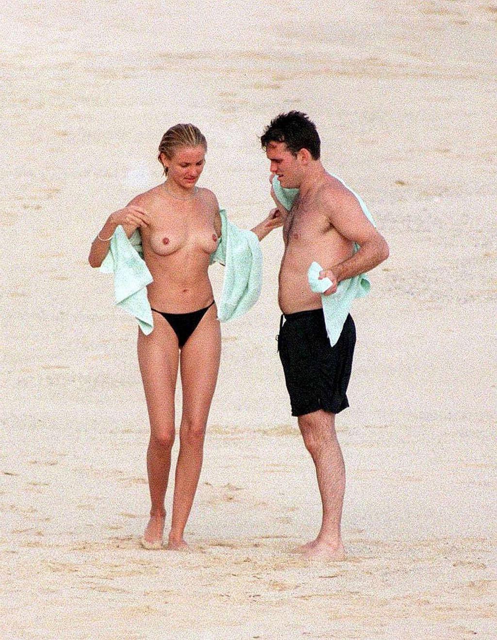 16P Cameron Diaz showing sexy ass in thong and enjoying on beach in topless