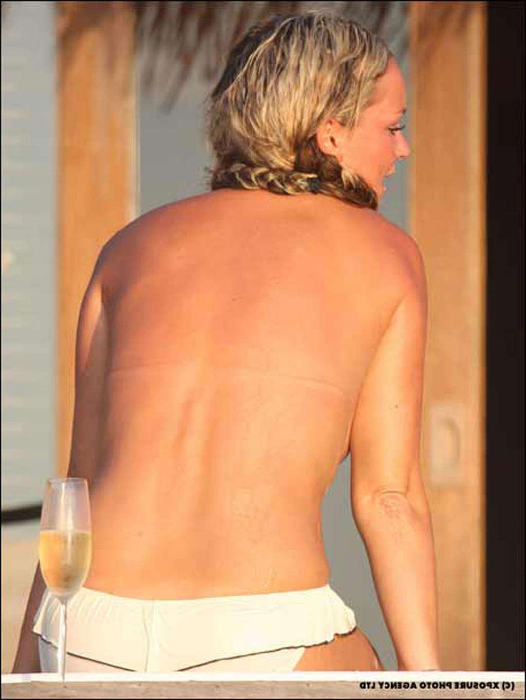 16P Jennifer Ellison enjoying on beach in topless and showing sweet ass in thong