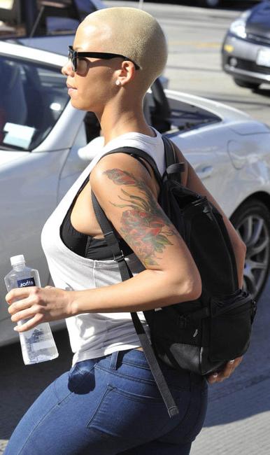 15P Amber Rose exposing marble ass in thong bikini