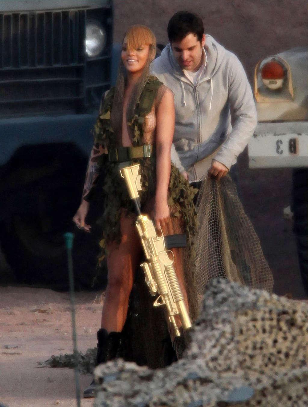 10P Rihanna nipple slip and exposing her nice big tits on video set in military styl