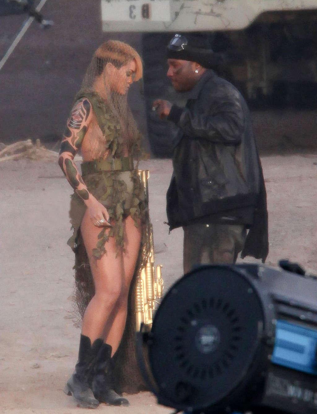 10P Rihanna nipple slip and exposing her nice big tits on video set in military styl