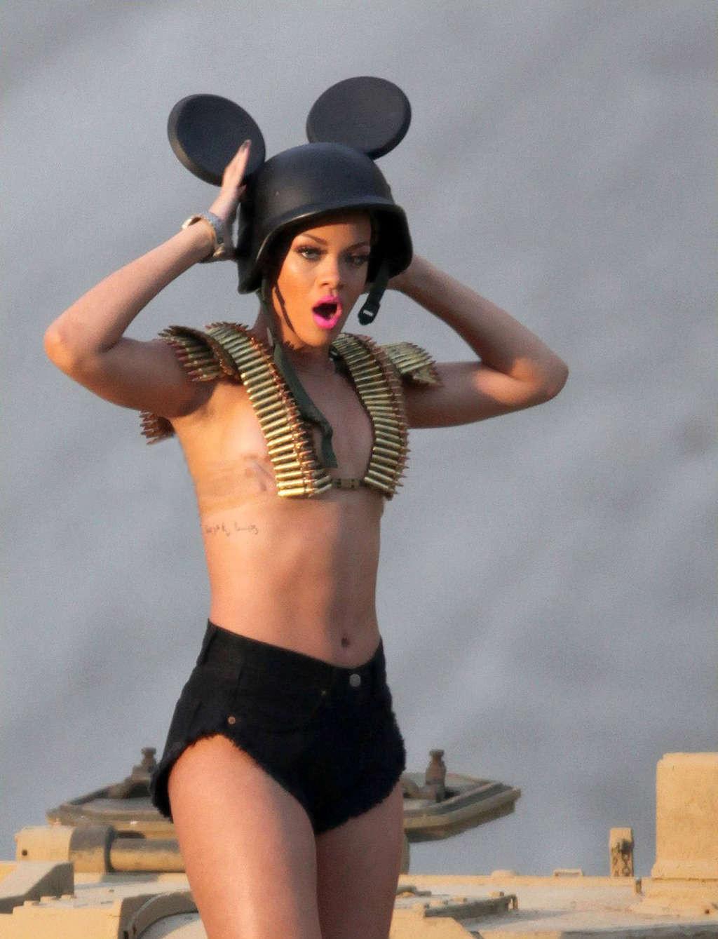 10P Rihanna nipple slip and exposing her nice big tits on video set in military styl