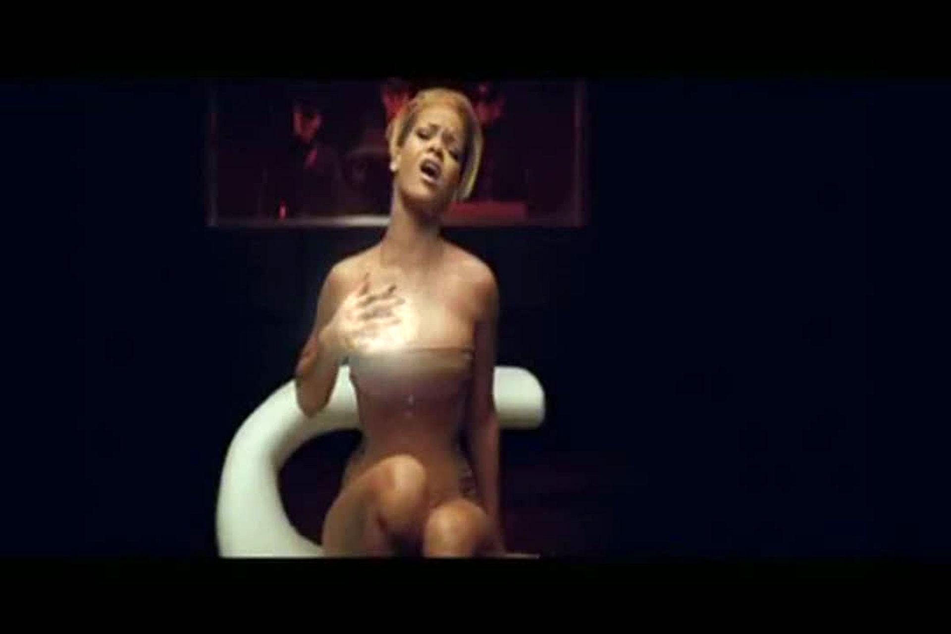 16P Rihanna looking hot and sexy in caps from her last video spot