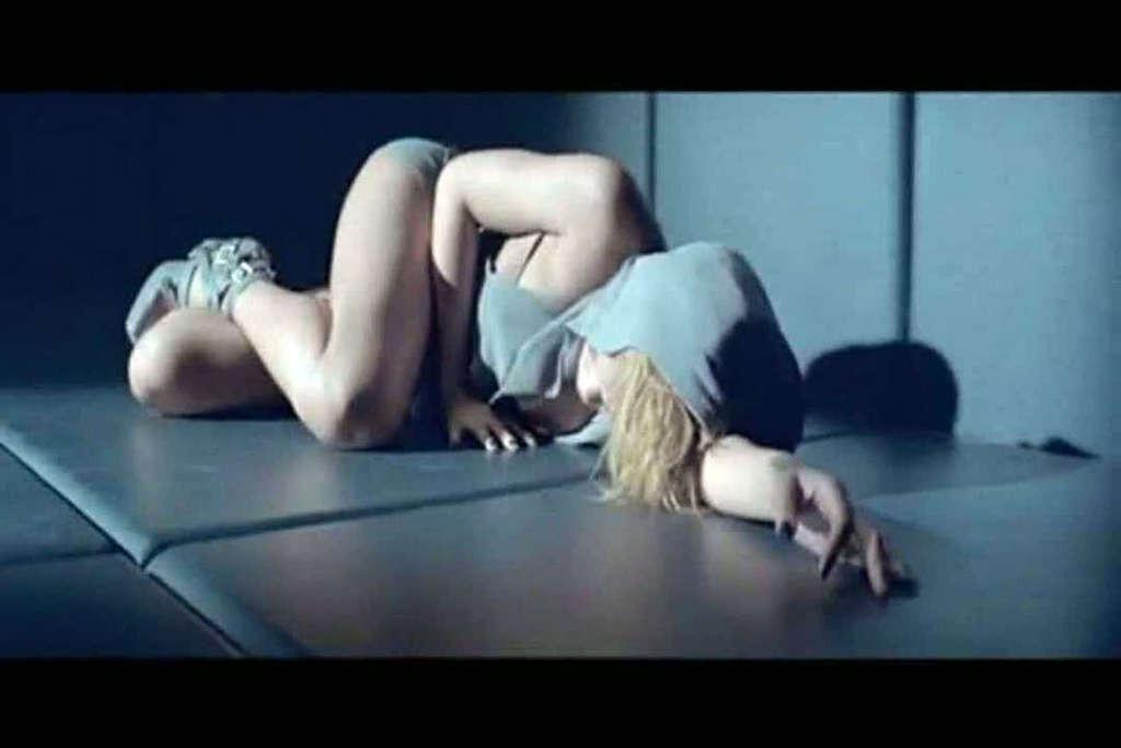 16P Rihanna looking hot and sexy in caps from her last video spot