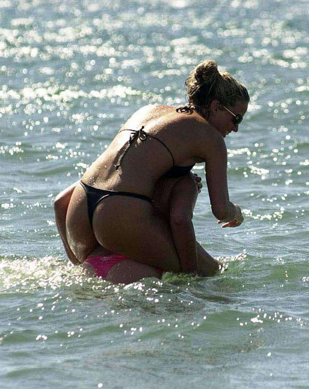 16P Sarah Harding exposing her ass in thong on beach and upskirt