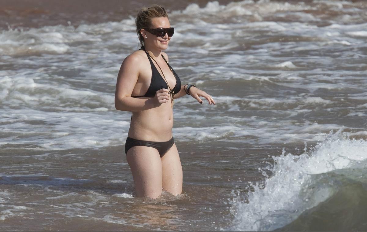 15P Hilary Duff sweet ass in tight black bikini