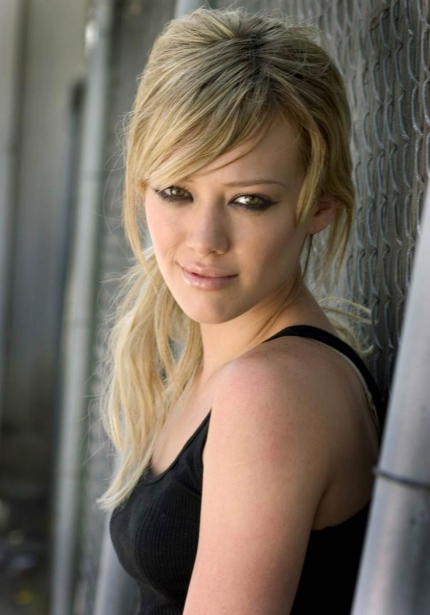 15P Hilary Duff sweet ass in tight black bikini