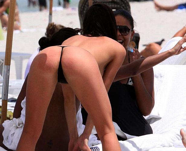 10P Sanaa Lathan showing her tits and ass in thong on beach paparazzi pictures