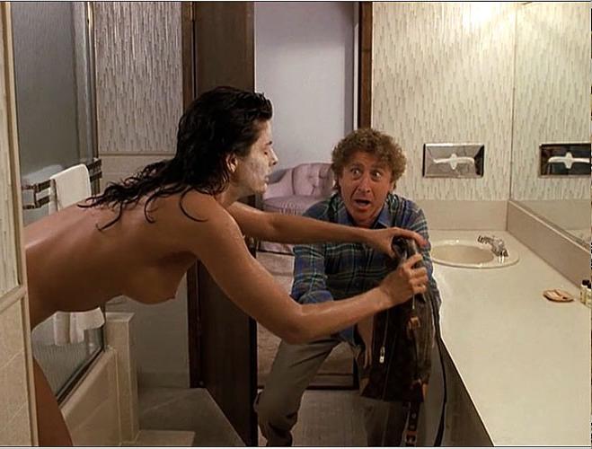 16P Joan Severance showing her nice big tits and bathing nude