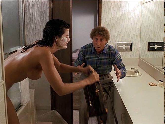 16P Joan Severance showing her nice big tits and bathing nude