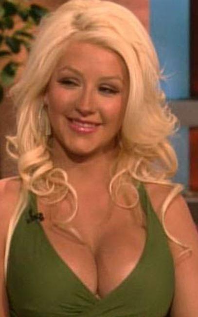 20P Celebrity Christina Aguilera great cleavage and nude in bathroom