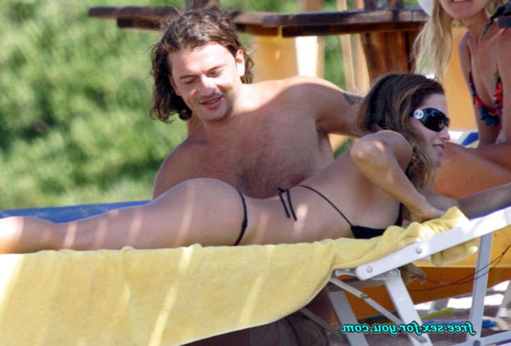 16P Lola Ponce posing sexy in a thong and in bikini on beach