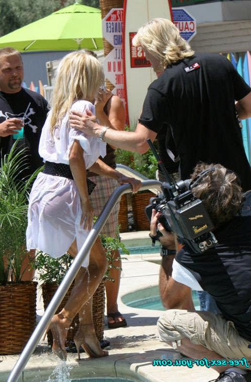 16P Pamela Anderson showing thong in wet see thru dres