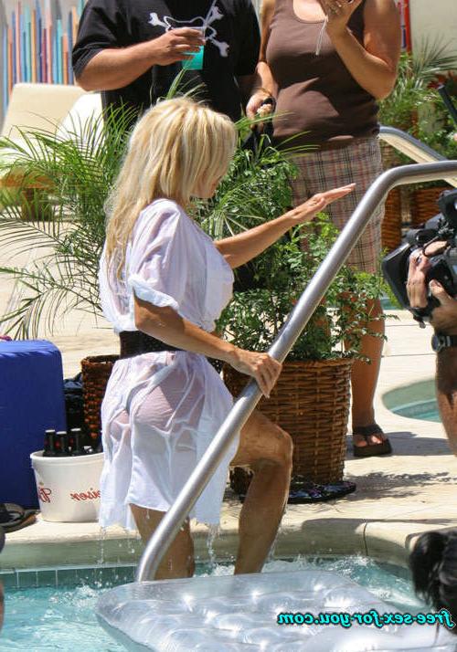 16P Pamela Anderson showing thong in wet see thru dres