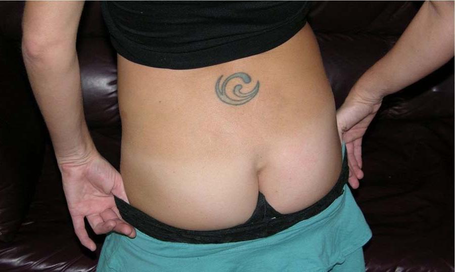 15P Picture selection of a hot tattooed wife who got naked