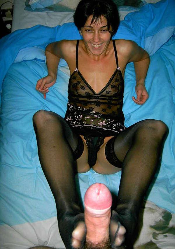 15P Pictures of a housewife in lingerie playing with a cock
