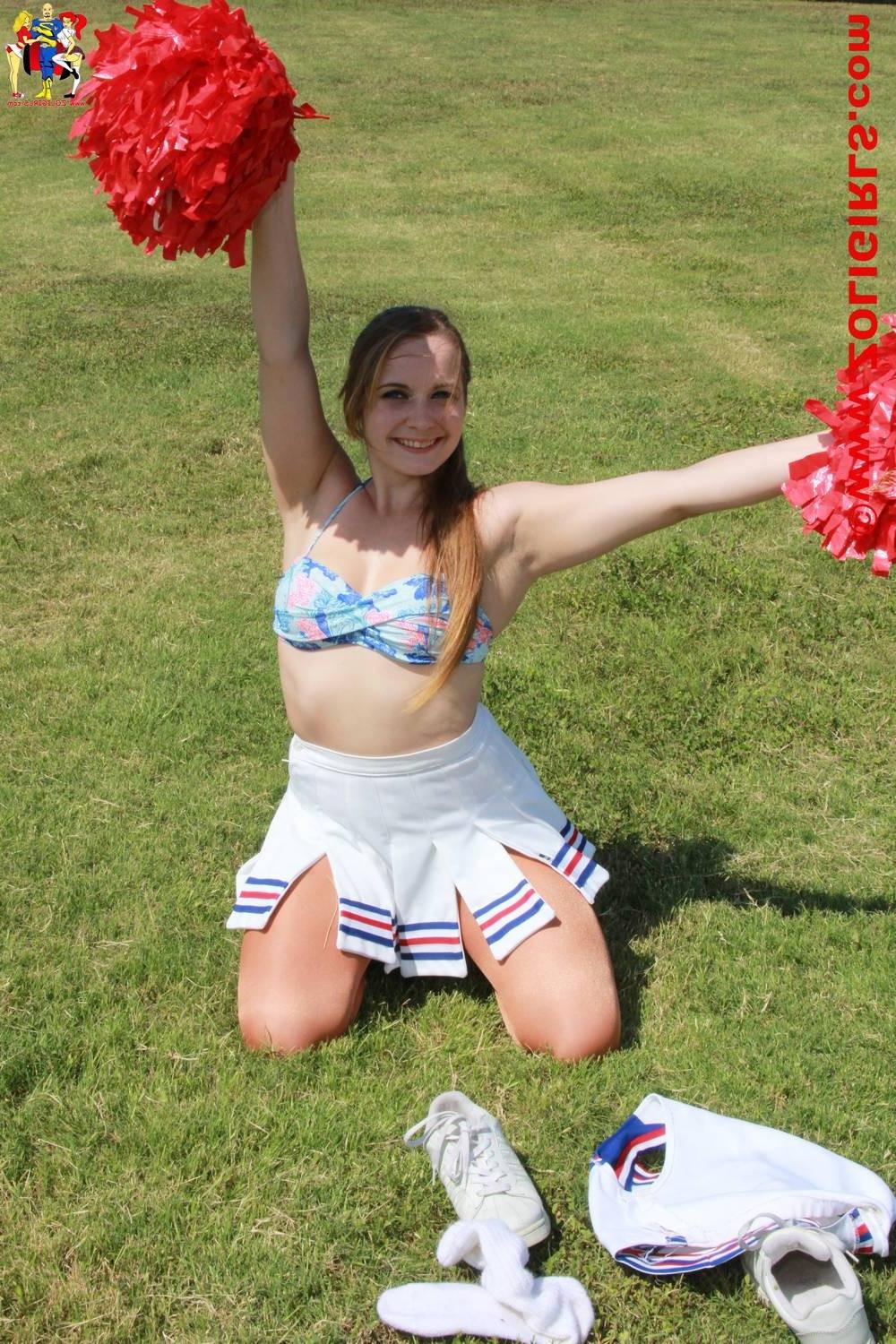 15P Cute cheerleader posing outside in her pantyhose