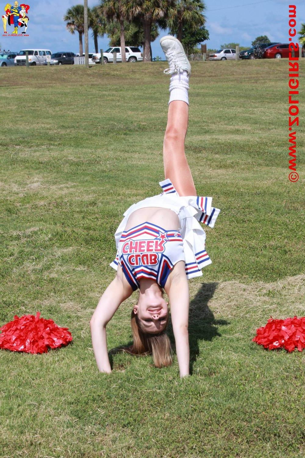 15P Cute cheerleader posing outside in her pantyhose
