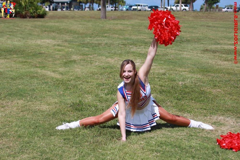 15P Cute cheerleader posing outside in her pantyhose