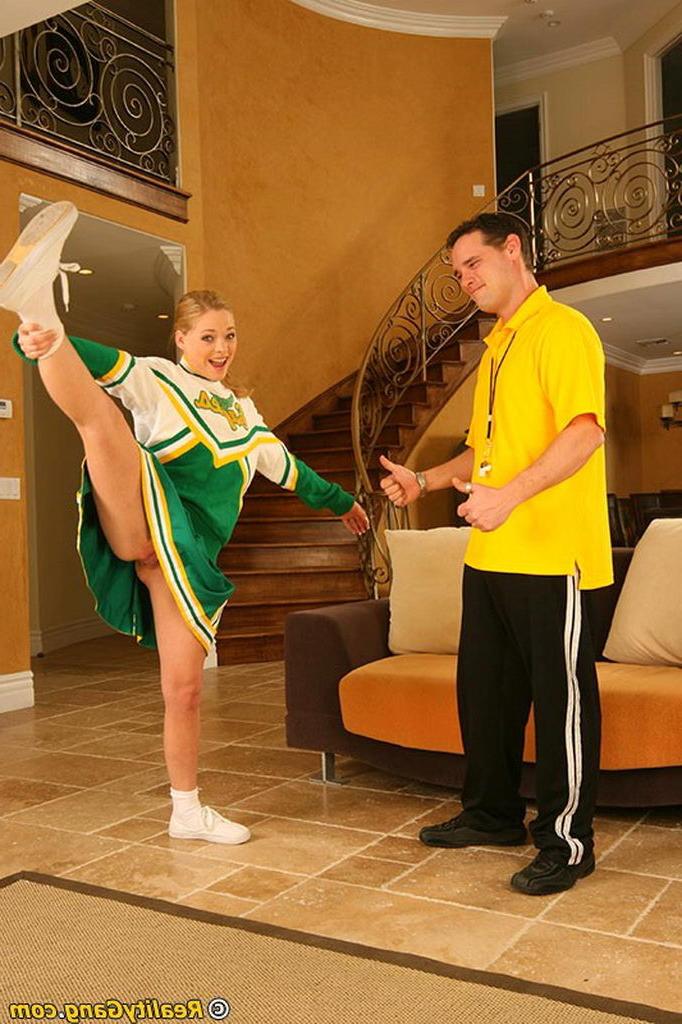20P Cute redhead cheerleader getting dicked