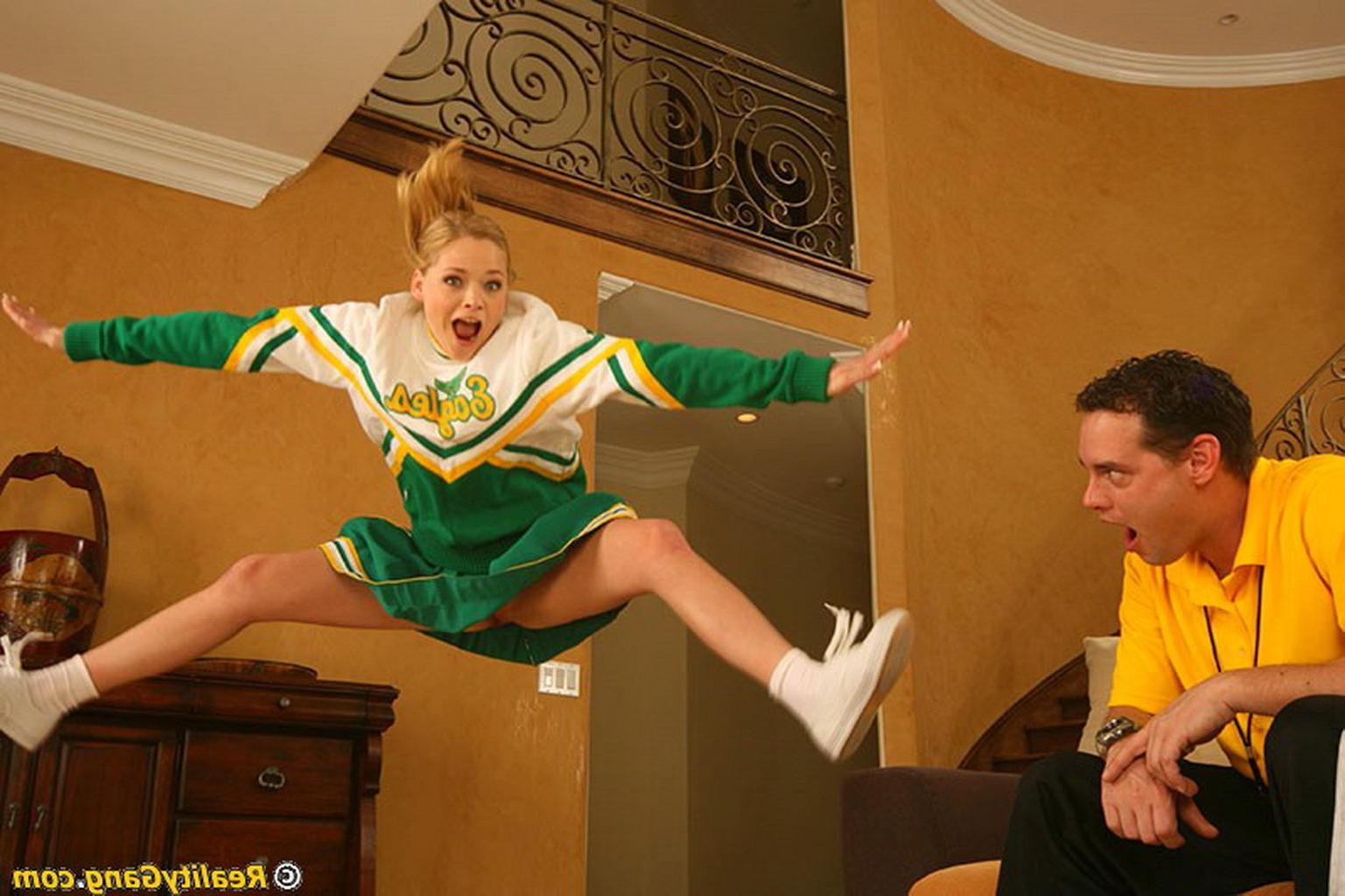 20P Cute redhead cheerleader getting dicked