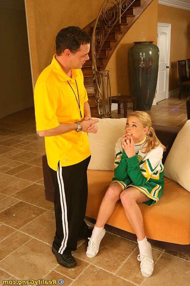 20P Cute little redhead cheerleader getting banged