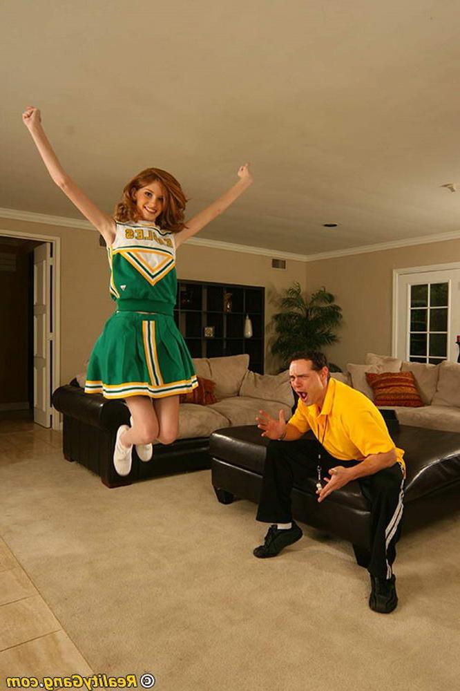 20P Cute redhead cheerleader gets a lesson in fucking 101