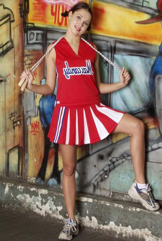 20P Gorgeous cheerleader loves to tease while flasing her pussy