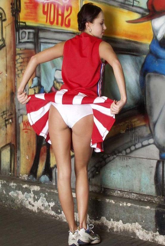 20P Gorgeous cheerleader loves to tease while flasing her pussy