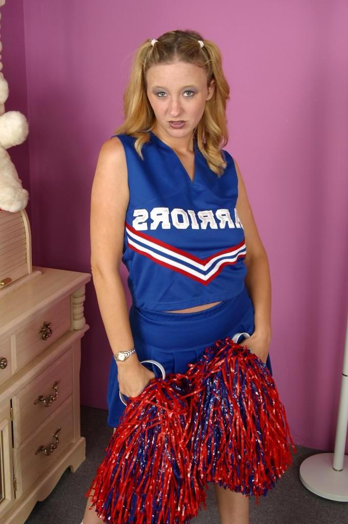 20P Horny busty cheerleader loves to tease while playing dildo