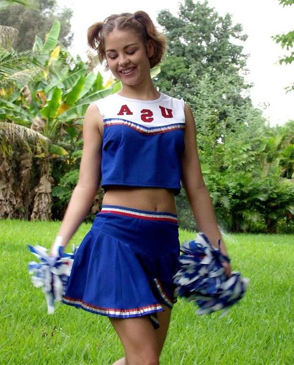 20P Horny amateur teen cheerleader loves strip teasing outdoors