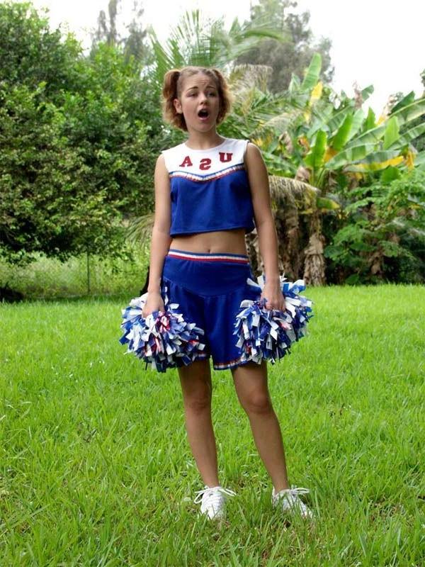 20P Horny amateur teen cheerleader loves strip teasing outdoors