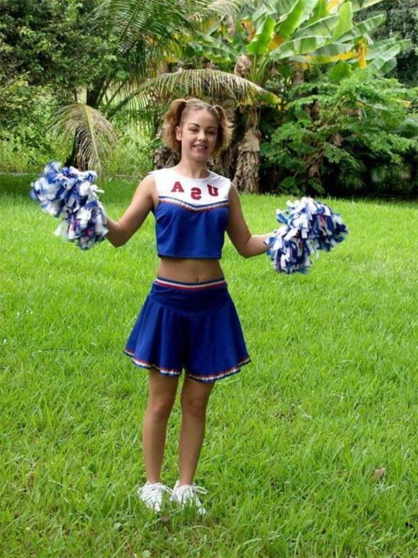 20P Horny amateur teen cheerleader loves strip teasing outdoors