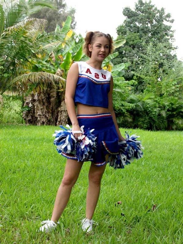 20P Horny amateur teen cheerleader loves strip teasing outdoors